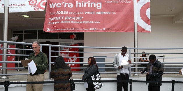 SAN FRANCISCO, CA - AUGUST 15: Job seekers wait in line to enter a job fair at a new Target retail store on August 15, 2013 in San Francisco, California. Hundreds of job seekers applied for jobs during a job fair to staff a new Target City store. According to a report by the Labor Department, the number of people seeking first time unemployment benefits fell to the lowest level since 2007 with initial jobless claims decreasing by 15,000 to 320,000. (Photo by Justin Sullivan/Getty Images)