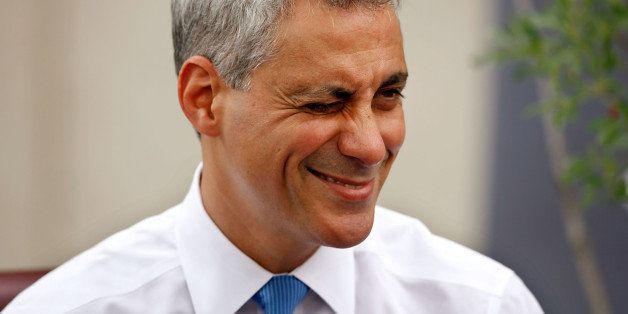 WASHINGTON - AUGUST 10: White House Chief of Staff Rahm Emanuel reacts after reading 'Duck for President,' by Doreen Cronin and Betsy Lewin, to students from Raymond and C.W. Harris Elementary schools during a Reading to the Top event at the Department of Education August 10, 2009 in Washington, DC. The department's Reading to the Top program, which runs through Sept. 11, features various children's books read by the Secretary Duncan, other Cabinet members and top Administration officials. (Photo by Chip Somodevilla/Getty Images)