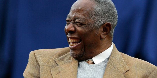 ATLANTA, GA - APRIL 08: Hall of Famer Hank Aaron enjoys a laugh as he is honored on the 40th anniversary of his 715th homer prior to the game between the Atlanta Braves and the New York Mets at Turner Field on April 8, 2014 in Atlanta, Georgia. (Photo by Kevin C. Cox/Getty Images)