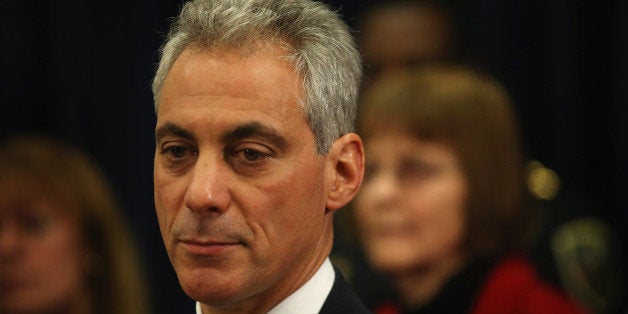 CHICAGO, IL - DECEMBER 20: Chicago Mayor Rahm Emanuel listens to speakers during a press conference with a group of Chicago area mayors, village presidents and police officials calling for stronger gun regulations December 20, 2012 in Chicago, Illinois. The group was calling for a return of the assault weapons ban. Chicago averaged about 675 murders a year during the 10 years the asssault weapons ban was in effect. So far this year, Chicago has had about 490 murders. (Photo by Scott Olson/Getty Images)