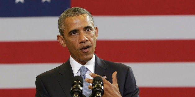 WASHINGTON, DC - JULY 21: U.S. President Barack Obama speaks about the about My Brother's Keeper initiative at the Walker Jones Education Campus on July 21, 2014 in Washington, DC. Obama spoke to area youth during a town hall meeting about the initiaive that is intended to help young men and boys of color. (Photo by Chris Kleponis-Pool/Gettt Images)