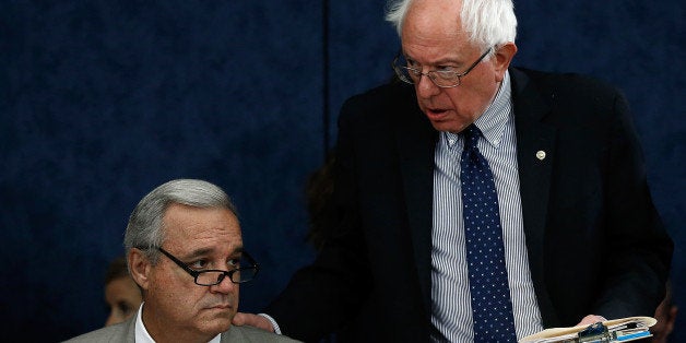 WASHINGTON, DC - JUNE 24: Senate Veterans Affairs Committee Chairman Bernie Sanders (I-VT) (R) speaks with House Veterans Affairs Committee Chairman Jeff Miller (R-FL) (L) during a meeting of the Senate-House Veterans Affairs Conference Committee June 24, 2014 at the U.S. Capitol in Washington, DC. The conference committee met on H.R.3230, to improve the access of veterans to medical services from the Veterans Affairs Department. (Photo by Win McNamee/Getty Images)