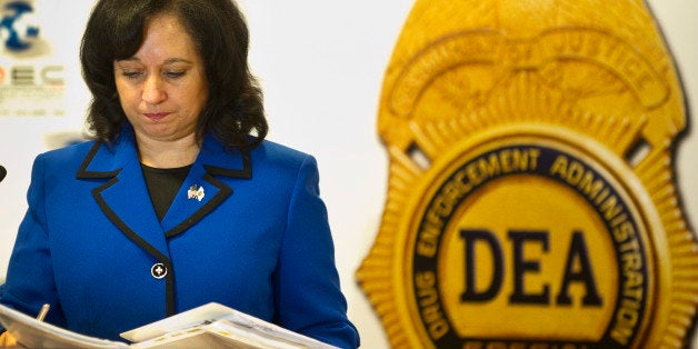 US Deputy administrator of the US Drug Enforcement Administration, Michele Leonhart, holds folders with documents during the XXVII International Drug Enforcement Conference (IDEC ), April 27, 2010 in Rio de Janeiro, Brazil. AFP PHOTO/ANTONIO SCORZA (Photo credit should read ANTONIO SCORZA/AFP/Getty Images)