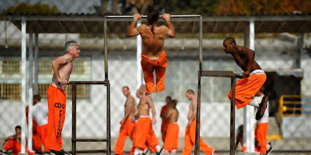 CHINO, CA - DECEMBER 10: Inmates at Chino State Prison exercise in the yard December 10, 2010 in Chino, California. The U.S. Supreme Court is preparing to hear arguments to appeal a federal court's ruling last year that the California state prison system would have to release 40,000 prisoners to cope with overcrowding so severe that it violated their human rights. More than 144,000 inmates are currently incarcerated in prisons that were designed to hold about 80,000. (Photo by Kevork Djansezian/Getty Images)