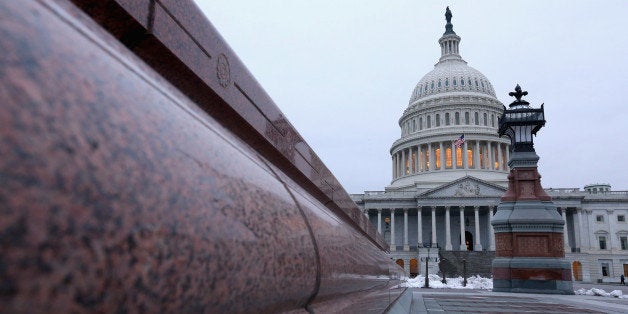 WASHINGTON, DC - MARCH 19: The U.S. Capitol dome is seen before work begins on a two-year, $60 million rnovation of March 19, 2014 in Washington, DC. Curved rows of scaffolds will encircle the dome starting this spring, enabling contractors to strip multiple layers of paint and repair more than 1,000 cracks and broken pieces. (Photo by Chip Somodevilla/Getty Images)