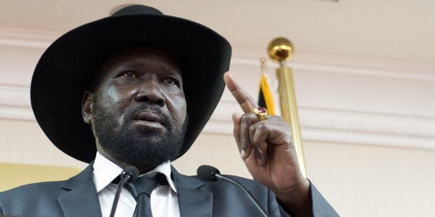 South Sudan President Salva Kiir holds a press conference in a room full of ministers and journalists, urging peace and reconciliation, after four high profile detainees accused of plotting a coup were released earlier on April 25, 2014 in Juba. South Sudan on Friday released four top leaders accused of rebellion and treason, dropping charges for attempting to overthrow the government in a move aimed at ending a four-month-old civil war. AFP PHOTO / CHARLES LOMODONG (Photo credit should read CHARLES ATIKI LOMODONG/AFP/Getty Images)