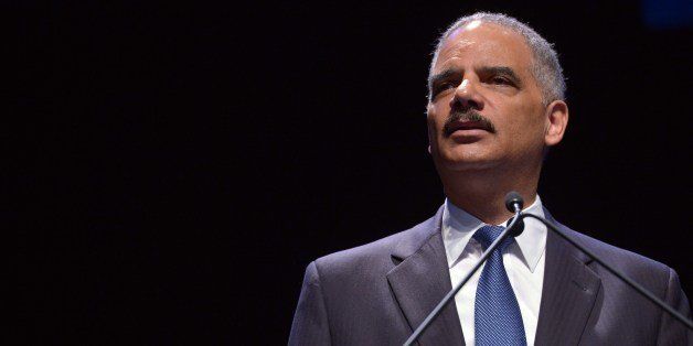 US Attorney General Eric Holder speaks during an event to celebrate the 50th Anniversary of the Civil Rights Act of 1964 on July 15, 2014 at Howard University in Washington, DC. AFP PHOTO/Mandel NGAN (Photo credit should read MANDEL NGAN/AFP/Getty Images)