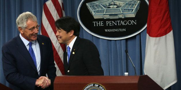 ARLINGTON, VA - JULY 11: U.S. Secretary of Defense Chuck Hagel (L) shakes hands with Japanese Minister of Defense Itsunori Onodera (R) during a joint news conference at the Pentagon July 11, 2014 in Arlington, Virginia. Onodera is on an eight-day visit in the U.S. (Photo by Alex Wong/Getty Images)