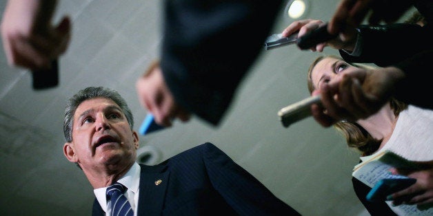 WASHINGTON, DC - JUNE 10: Senate Armed Services Committee Member U.S. Sen. Joe Manchin (D-WV) talks with reporters after being briefed by military officals about the prisoner exchange that freed Army Sgt. Bowe Bergdahl at the U.S. Capitol June 10, 2014 in Washington, DC. The trade of Bergdahl for five senior Taliban officials has angered some members of Congress because they were not informed of the swap beforehand. (Photo by Chip Somodevilla/Getty Images)