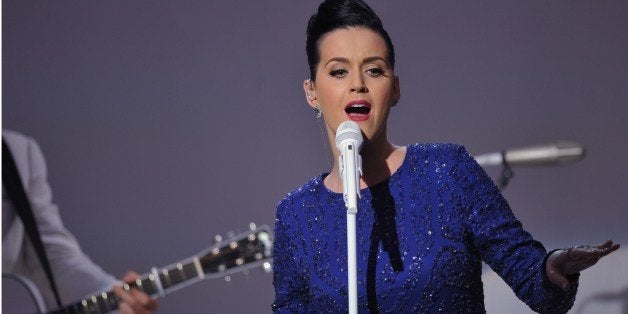 Singer Katy Perry performs at a concert in celebration of the Special Olympics on July 31, 2014 in the East Room of the White House in Washington, DC. AFP PHOTO/Mandel NGAN (Photo credit should read MANDEL NGAN/AFP/Getty Images)