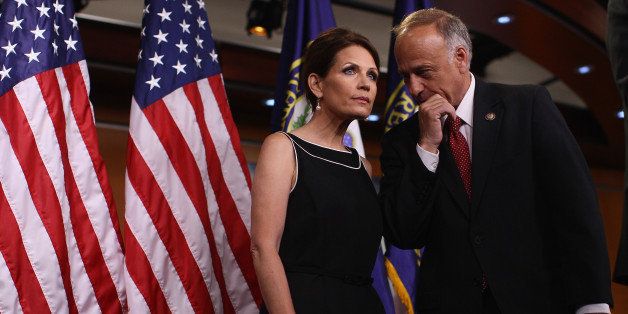 WASHINGTON, DC - JULY 13: (L-R) Republican presidential candidate and U.S. Rep. Michele Bachmann (R-MN) confers with U.S. Rep. Steve King (R-IA) during a news conference at the U.S. Capitol July 13, 2011 in Washington, DC. Bachmann and King spoke on legislation regarding the debt ceiling and military benefits. (Photo by Win McNamee/Getty Images)