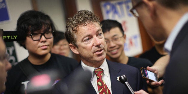 URBANDALE, IA - AUGUST 06: U.S. Rand Paul (R-KY) fields questions and greets guests after speaking at an event hosted by the Iowa GOP Des Moines Victory Office on August 6, 2014 in Urbandale, Iowa. Paul, who is expected to seek the 2016 Republican presidential nomination, was on a three-day eight-city tour of Iowa, the first state to select the presidential nominee. (Photo by Scott Olson/Getty Images)