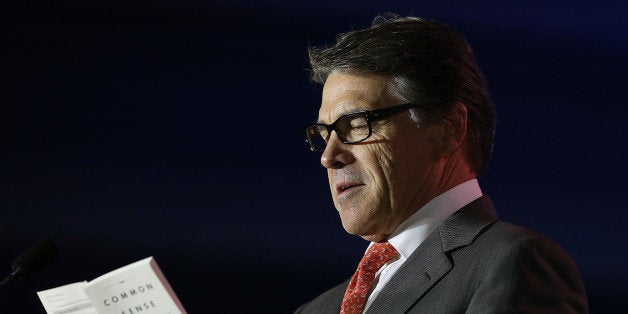 NEW ORLEANS, LA - MAY 31: Texas Gov. Rick Perry speaks during the final day of the 2014 Republican Leadership Conference on May 31, 2014 in New Orleans, Louisiana. Some of the biggest names in the Republican Party made appearances at the 2014 Republican Leadership Conference, which hosts 1,500 delegates from across the country through May 31. (Photo by Justin Sullivan/Getty Images)