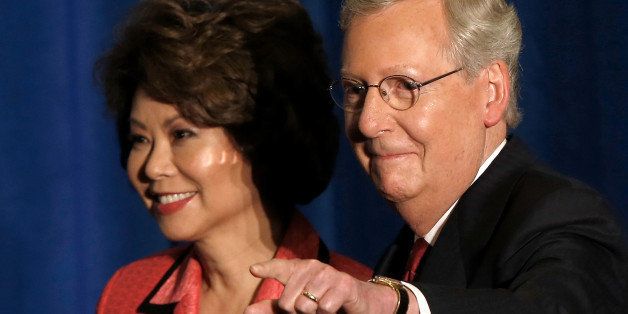LOUISVILLE, KY - MAY 20: U.S. Senate Republican leader Sen. Mitch McConnell (R-KY) and his wife Elaine Chao arrive for a victory celebration following the early results of the state Republican primary May 20, 2014 in Louisville, Kentucky. McConnell defeated Tea Party challenger Matt Bevin in today's primary and will likely face a close race in the fall against Democratic candidate, Kentucky Secretary of State Alison Grimes. (Photo by Win McNamee/Getty Images)