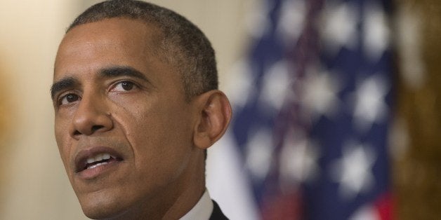 US President Barack Obama speaks about the situation in Iraq in the State Dining Room at the White House in Washington, DC, A