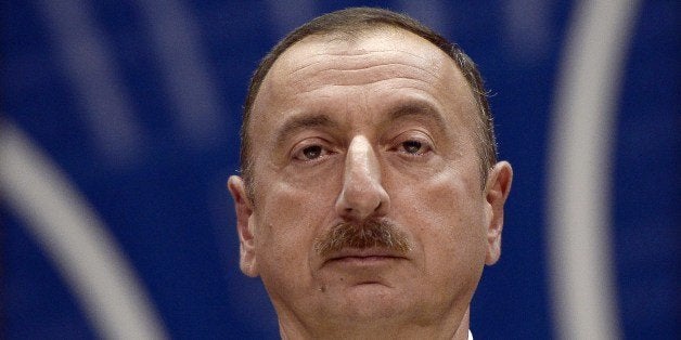 Azerbaijan President Ilham Aliyev delivers a speech to the Council of Europe parliamentary assembly in Strasbourg, eastern France, on June 24, 2014. AFP PHOTO/FREDERICK FLORIN (Photo credit should read FREDERICK FLORIN/AFP/Getty Images)