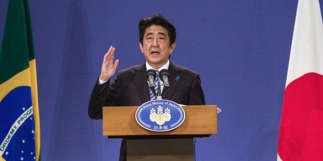 Japan's Prime Minister Shinzo Abe speaks during press conference in Sao Paulo, Brazil on August 02, 2014. Abe is on a three-d