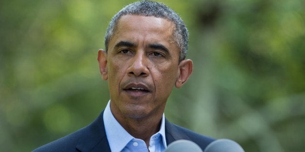 US President Barack Obama makes a statement on the situation in Iraq at Martha's Vineyard, Massachusetts, on August 11, 2014. AFP PHOTO/Nicholas KAMM (Photo credit should read NICHOLAS KAMM/AFP/Getty Images)