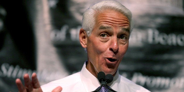 WEST PALM BEACH, FL - APRIL 14: Former Florida Republican Governor Charlie Crist, who is currently the leading Democrat trying to unseat incumbent Republican Gov. Rick Scott, addresses the Forum Club of the Palm Beaches at the Cohen Pavilion at the Kravis Center on April 14, 2014 in West Palm Beach, Florida. The former governor is showing a slight edge in the polls over Rick Scott as the campaign starts to heat up for the 2014 Florida gubernatorial election that will take place on November 4, 2014. (Photo by Joe Raedle/Getty Images)