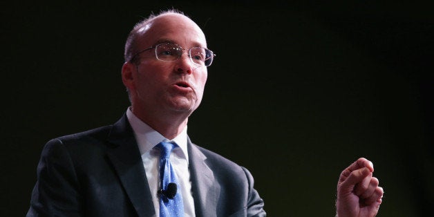 WASHINGTON, DC - MAY 19: Politico's Chief White House correspondent Mike Allen introduces former U.S. Treasury Secretary Timothy Geithner during the Politico Playbook Lunch at The Hamilton May 19, 2014 in Washington, DC. As President Barack Obama's first secretary of the Treasury, Geithner helped pilot the country through the worst financial crisis since the Great Depression. Part memoir, part crisis survival handbook, 'Stress Test' offers Geithner's behind-the-scenes account of how a group of policy makers worked to avoid a second depression. (Photo by Chip Somodevilla/Getty Images)