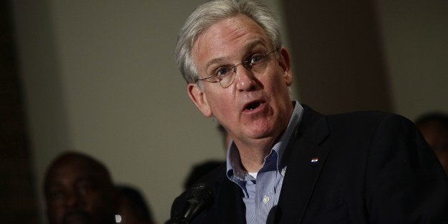 Missouri Governor Jay Nixon speaks about the shooting death of 18 year-old Michael Brown during a news conference August 16, 2014 in Ferguson, Missouri. Governor Nixon imposed a 12am curfew along with Missouri State Highway Patrol Captain Ronald Johnson for demonstrators continuing to protest the killing of Brown, who was shot and killed last week by Ferguson Police Officer Darren Wilson after being suspected in taking part in a robbery at a convenience store. AFP PHOTO / Joshua LOTT (Photo credit should read Joshua LOTT/AFP/Getty Images)