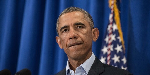 US President Barack Obama makes a statement to the press on the death of American journalist James Foley at Martha's Vineyard, Massachusetts August 20, 2014. The United States has carried out more air strikes in Iraq, a senior US defense official said, as Islamic militants threaten to execute a second US journalist. AFP PHOTO/Nicholas KAMM (Photo credit should read NICHOLAS KAMM/AFP/Getty Images)