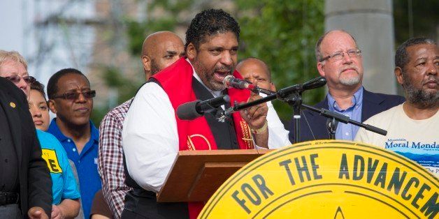 ASHEVILLE, NC - AUGUST 04: Rev. Dr. William J. Barber attends Mountain Moral Monday 2014 at Pack Square Park on August 4, 2014 in Asheville, North Carolina. (Photo by Alicia Funderburk/Getty Images)