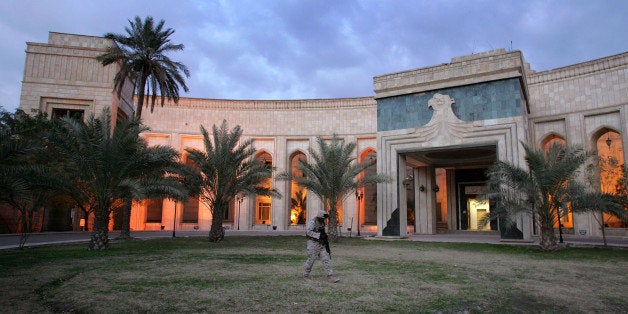 BAGHDAD, IRAQ - FEBRUARY 05: U.S. Marine Cpl. Chilet Paul from Miami, Florida, walks past the American Embassy February 5, 2