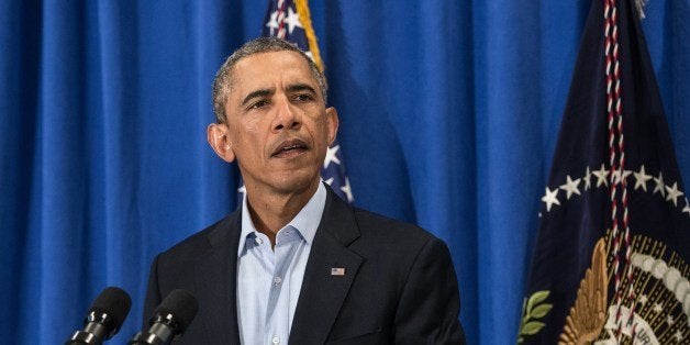 US President Barack Obama makes a statement at Martha's Vineyard, Massachusetts, on August 20, 2014. The United States has carried out more air strikes in Iraq, a senior US defense official said, as Islamic militants threaten to execute a second US journalist. AFP PHOTO/Nicholas KAMM (Photo credit should read NICHOLAS KAMM/AFP/Getty Images)