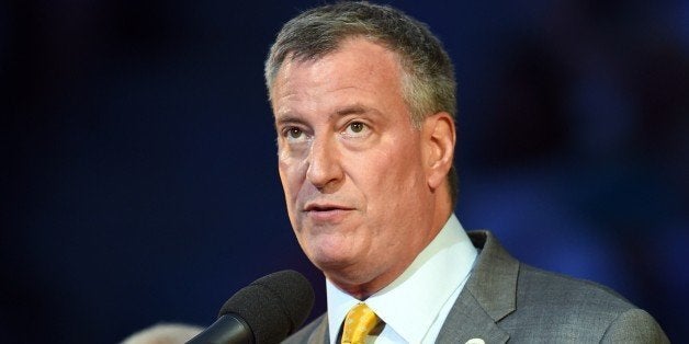 New York City Mayor Bill de Blasio participates in the opening ceremonies at the US Open 2014 at the USTA Billie Jean King National Center August 25, 2014 in New York. AFP PHOTO/Don Emmert (Photo credit should read DON EMMERT/AFP/Getty Images)