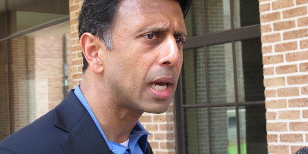 Gov. Bobby Jindal speaks about an injunction request that his lawyer filed, Wednesday, Aug. 6, 2014 in Baton Rouge, La. Jindal is seeking to stop the state's use of testing material aligned with Common Core education standards. (AP Photo/Melinda Deslatte)