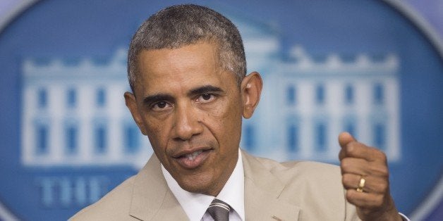 US President Barack Obama holds a press conference in the Brady Press Briefing Room at the White House in Washington, DC, Aug