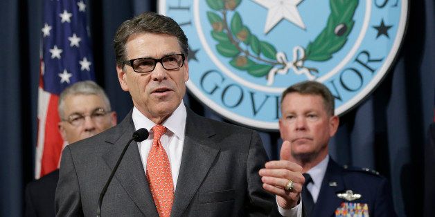Gov. Rick Perry speaks during a news conference in the Governor's press room, Monday, July 21, 2014, in Austin, Texas. Gov. Perry announced he is deploying up to 1,000 National Guard troops over the next month to the Texas-Mexico border to combat criminals that Republican state leaders say are exploiting a surge of children and families entering the U.S. illegally. (AP Photo/Eric Gay)