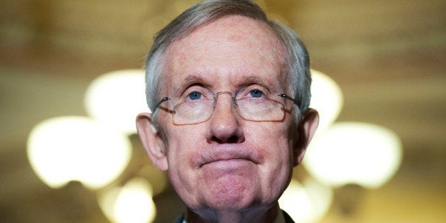 UNITED STATES - JULY 15: Senate Majority Leader Harry Reid, D-Nev., speaks with reporters after the senate luncheons in the Capitol, July 15, 2014. (Photo By Tom Williams/CQ Roll Call)