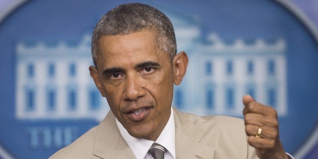 US President Barack Obama holds a press conference in the Brady Press Briefing Room at the White House in Washington, DC, Aug