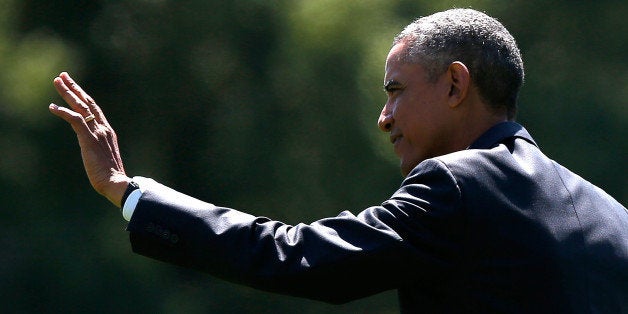 WASHINGTON, DC - AUGUST 29: U.S. President Barack Obama departs the White House August 29, 2014 in Washington, DC. Obama is