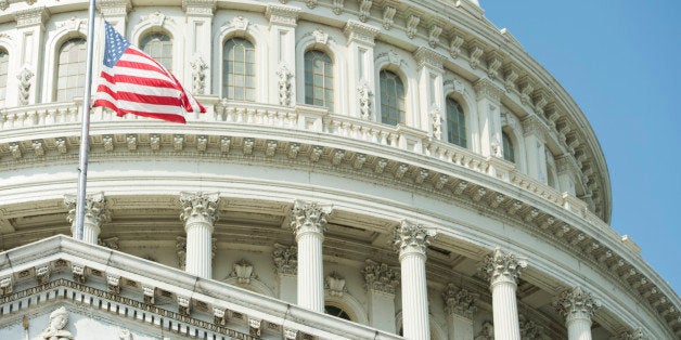 UNITED STATES - SEPTEMBER 11: A US Capitol Police sharpshooter, lower right corner, keeps watch with his binoculars during the 9-11 Remembrance Ceremony on the Capitol steps on Wednesday, Sept. 11, 2013. (Photo By Bill Clark/CQ Roll Call)