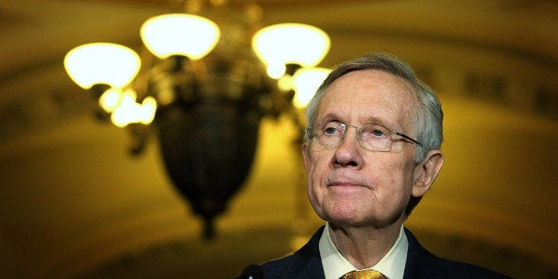 WASHINGTON, DC - DECEMBER 04: U.S. Senate Majority Leader Harry Reid (D-NV) speaks to members of the media after the Senate Democratic Weekly Policy Luncheon December 4, 2012 on Capitol Hill in Washington, DC. Reid addressed negotiations to avert the fiscal cliff and mentioned possible changes to filibuster rules in the Senate. (Photo by Alex Wong/Getty Images)