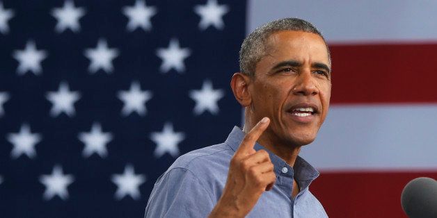 President Barack Obama speaks at Laborfest 2014 at Henry Maier Festival Park in Milwaukee on Labor Day, Monday, Sept. 1, 2014. (AP Photo/Charles Dharapak)