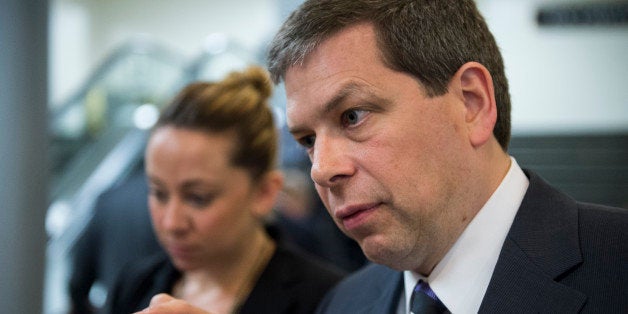 UNITED STATES - MAY 13: Sen. Mark Begich, D-Alaska, speaks with a reporter in the Capitol following a vote on Tuesday, May 13, 2014. (Photo By Bill Clark/CQ Roll Call)