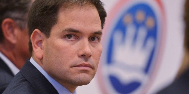 Senator Marco Rubio, R-FL, is seated before his address on the American family and cultural values.' at Catholic University on July 23, 2014 in Washington, DC. AFP PHOTO/Mandel NGAN (Photo credit should read MANDEL NGAN/AFP/Getty Images)