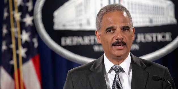 WASHINGTON, DC - AUGUST 21: Attorney General Eric Holder makes a major financial fraud announcement during a press conference August 21, 2014 at the Justice Department in Washington, DC. The Justice Department has reached a $16.65 billion settlement with Bank of America Corporation for financial fraud leading up to and during the financial crisis, the largest civil settlement with a single entity in American history, to resolve federal and state claims against Bank of America and its former and current subsidiaries, including Countrywide Financial Corporation and Merrill Lynch. (Photo by Alex Wong/Getty Images)