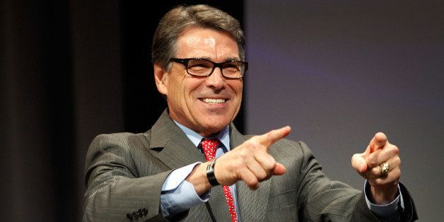 DALLAS, TX - AUGUST 29: Texas Governor Rick Perry speaks at the Defending the American Dream Summit sponsored by Americans For Prosperity at the Omni Hotel on August 29, 2014 in Dallas, Texas. Included to speak at the eighth annual summit are U.S. Senators Rand Paul and Ted Cruz as the summit will run until August 30th. (Photo by Mike Stone/Getty Images)