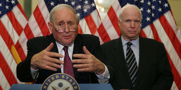 WASHINGTON, DC - MAY 20: U.S. Sen. Carl Levin (D-MI) (L), Chairman of the Senate Investigations Subcommittee, and U.S. Sen. John McCain (R-AZ) speak to reporters during a briefing on Capitol Hill, May 20, 2013 in Washington, DC. The briefing was held in advance of Tuesday's hearing on offshore profit shifting and the United States tax code. (Photo by Mark Wilson/Getty Images)
