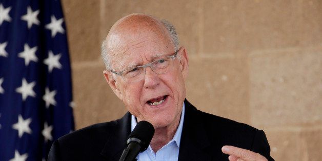 Republican Sen. Pat Roberts, left, answers a question during a debate with independent candidate Greg Orman listens during a debate at the Kansas State Fair Saturday, Sept. 6, 2014, in Hutchinson, Kan. (AP Photo/Charlie Riedel)