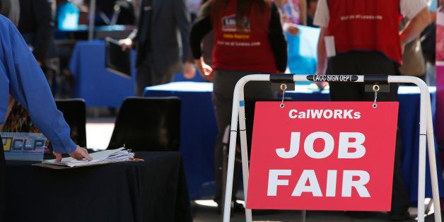 CalWORKs Job Fair signage is displayed during the Fall Classic Hiring Spree event at Los Angeles City College in Los Angeles, U.S., on Thursday, Oct. 10, 2013. Economists and policy-makers have been trying to understand the reason for the prolonged period of high unemployment in the U.S.: a skills mismatch, weak aggregate demand, or wage rigidities. Photographer: Patrick T. Fallon/Bloomberg via Getty Images
