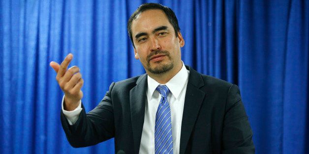 Tim Wu, a candidate for New York lieutenant governor, speaks during a news conference on Thursday, Aug. 28, 2014, in Albany, N.Y. (AP Photo/Mike Groll)
