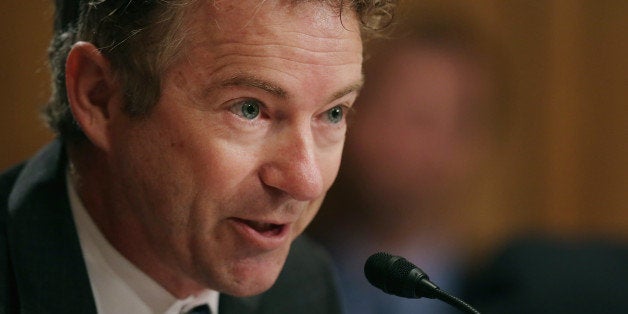 WASHINGTON, DC - SEPTEMBER 09: Sen. Rand Paul (R-KY) questions witnesses about military equipment given to local law enforcement departments by the federal government during a Senate Homeland Security and Governmental Affairs Committee hearing about at the Dirksen Senate Office Building on Capitol Hill September 9, 2014 in Washington, DC. In the wake of the Ferguson, MO, police response to peaceful protests, senators on the committee were critical of the federal grant programs that allow local and state law enforcement agencies to buy armored vehicles, assult rifles, body armor and other military equipment. (Photo by Chip Somodevilla/Getty Images)