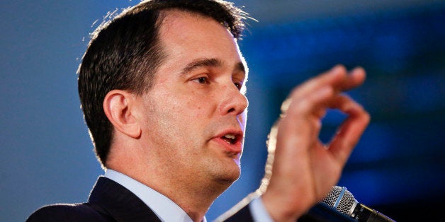 Wisconsin Republican Gov. Scott Walker speaks at the Republican National Committee summer meetings in Chicago, Friday, Aug. 8, 2014. (AP Photo/Kamil Krzaczynski)