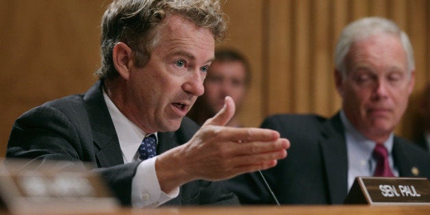 WASHINGTON, DC - SEPTEMBER 09: Sen. Rand Paul (R-KY) questions witnesses about military equipment given to local law enforcement departments by the federal government during a Senate Homeland Security and Governmental Affairs Committee hearing about at the Dirksen Senate Office Building on Capitol Hill September 9, 2014 in Washington, DC. In the wake of the Ferguson, MO, police response to peaceful protests, senators on the committee were critical of the federal grant programs that allow local and state law enforcement agencies to buy armored vehicles, assult rifles, body armor and other military equipment. (Photo by Chip Somodevilla/Getty Images)